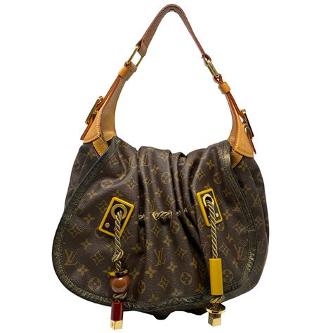 louis vuitton kalahari madonna|Louis Vuitton Kalahari LV Monogram Madonna GM Bag Limit .